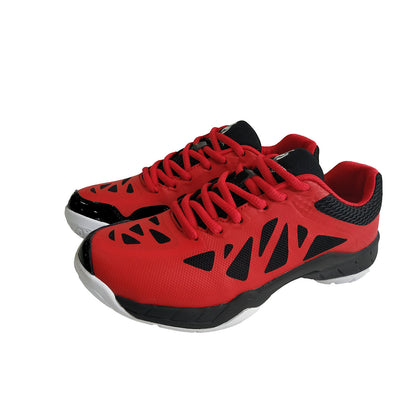 Red and black athletic shoes on a white background